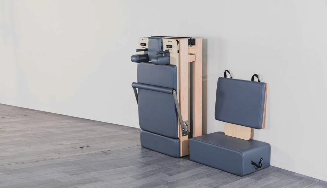 Foldable maple Pilates reformer from the Rèforme Flex Collection