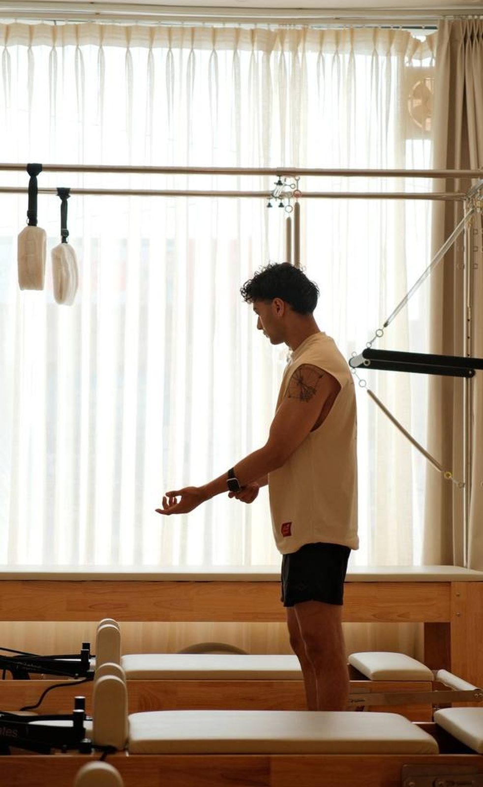 Yashik Chugh, founder of Rèforme Wellness, in a Pilates studio